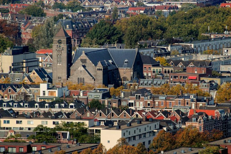 a view of a city with a clock tower